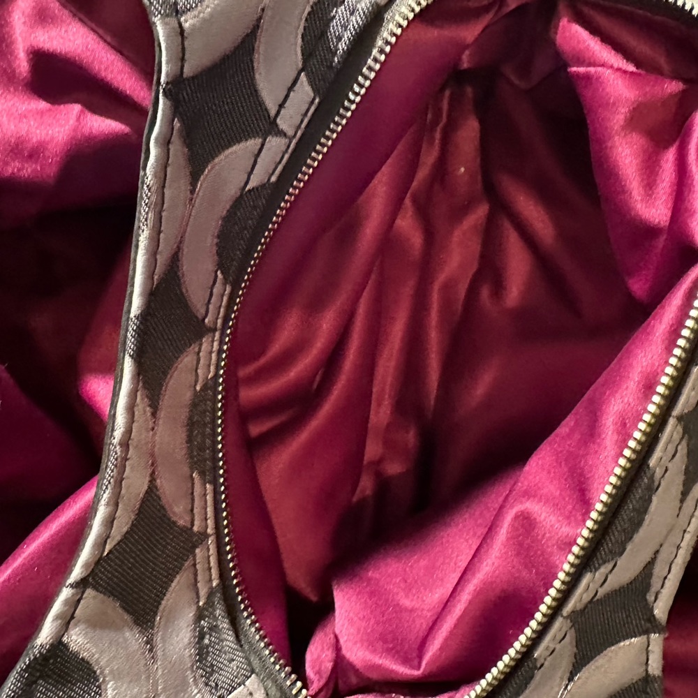 Black and silver Coach Mia Maggie.